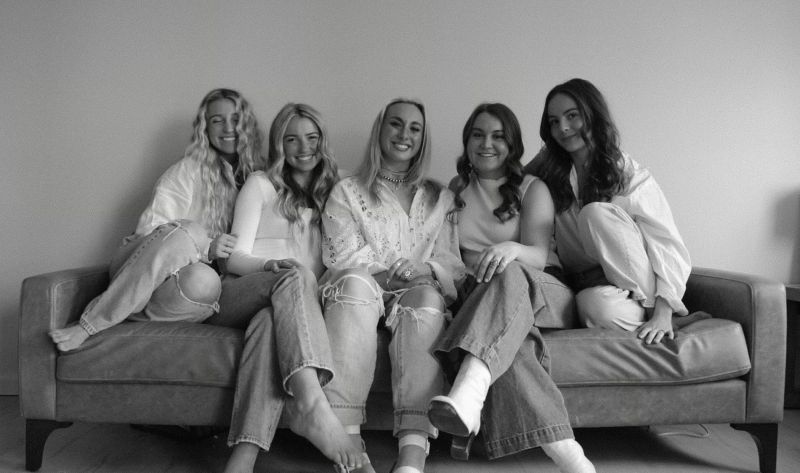 Black and White photo of fomeno team Ashlyn Atwood, Anna Atwood, Annie Lien, Payton Ryz, Brigit Blote